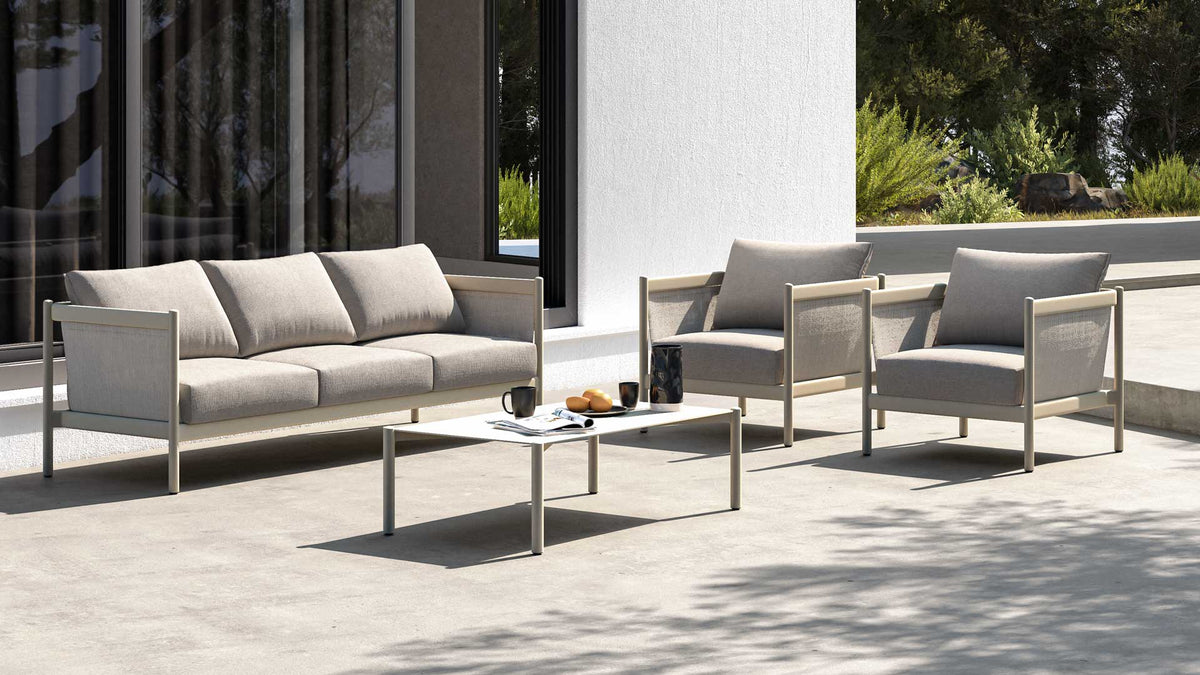 Perennial modern aluminum outdoor lounge set with taupe coloured sofa and chairs
