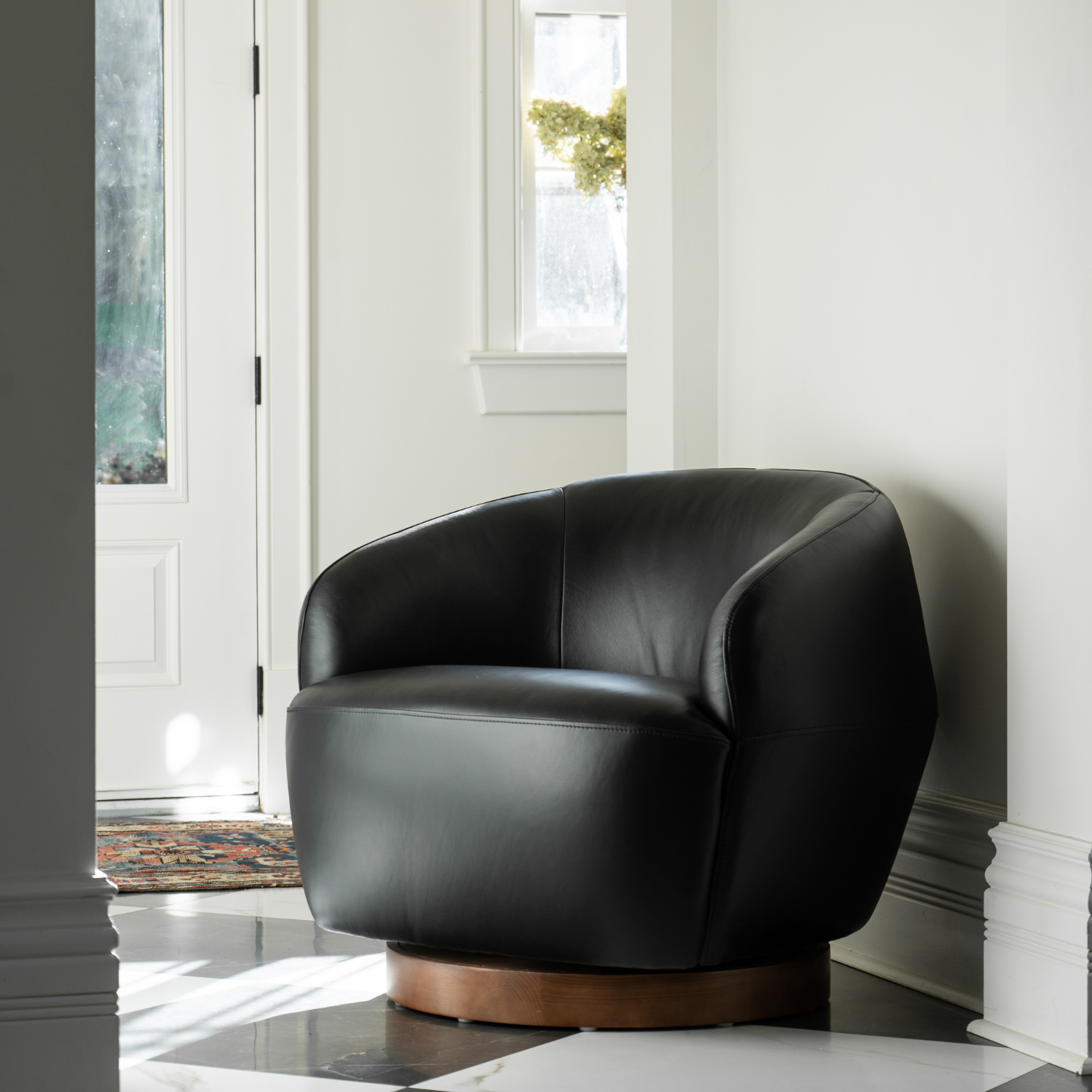 Pod Leather Swivel Lounge Chair