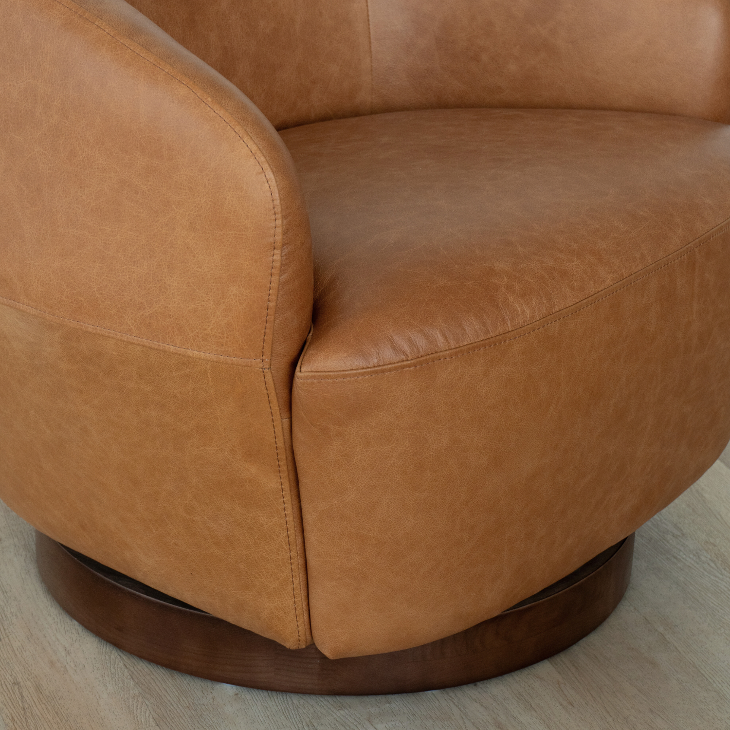 Pod Leather Swivel Lounge Chair