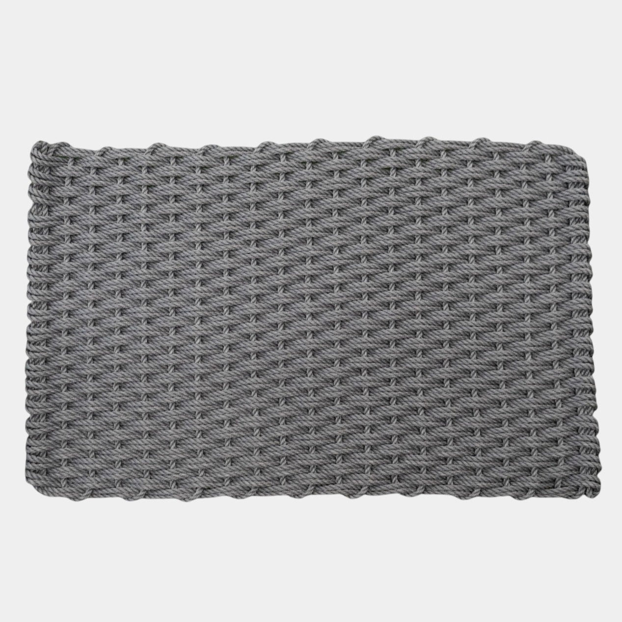 Gray woven mat on a light gray background