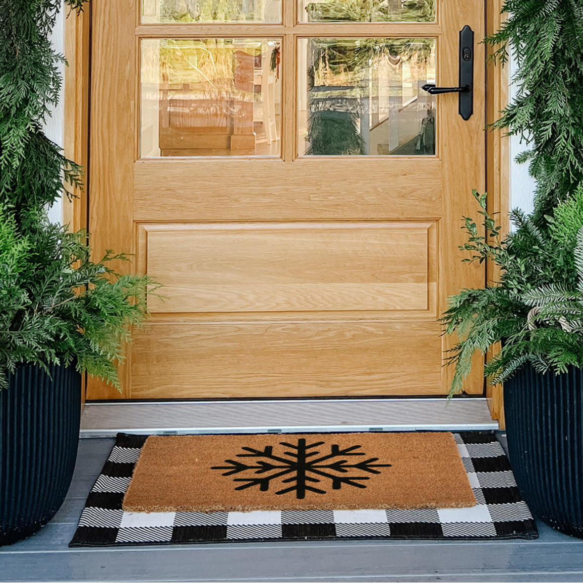 Black Snowflake Doormat