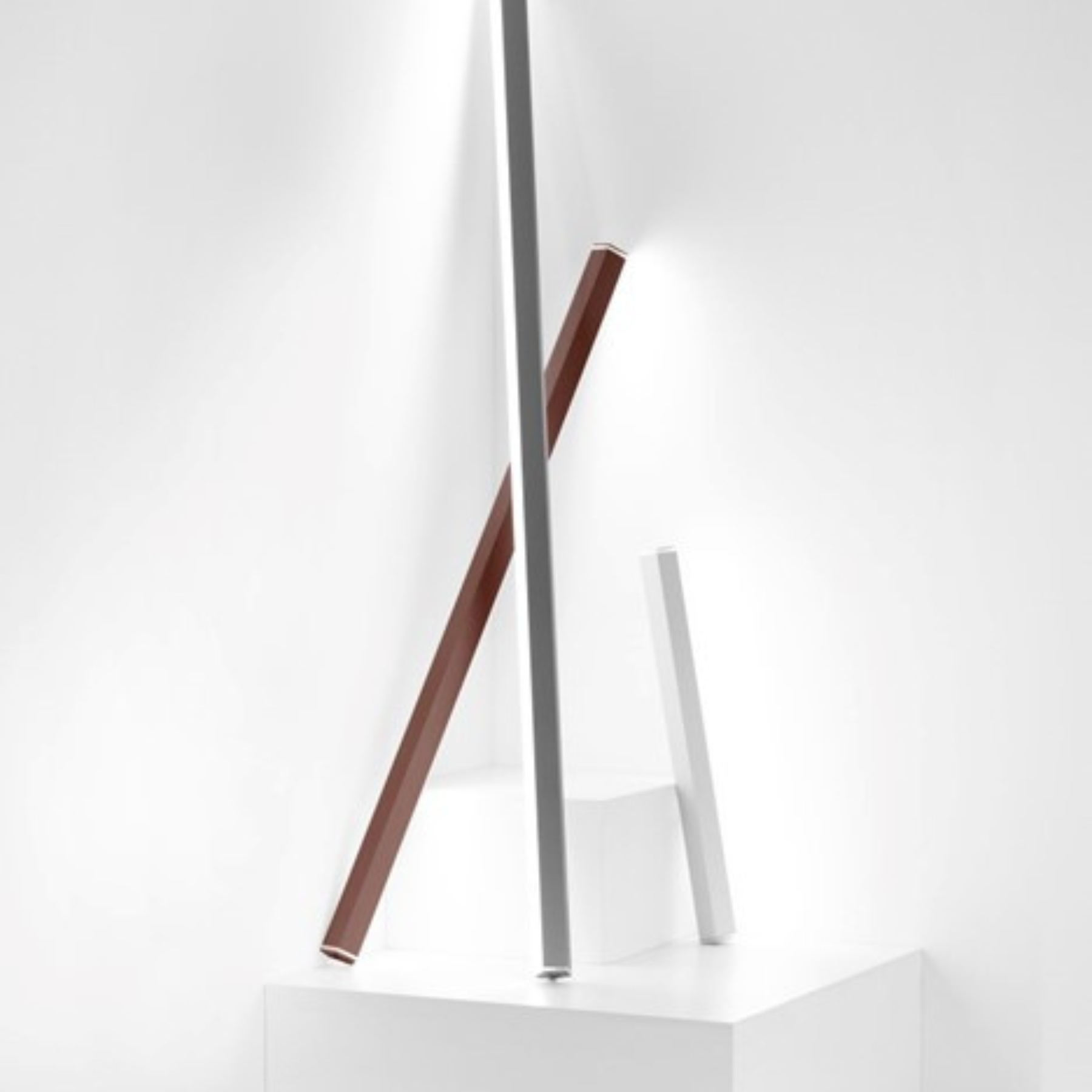 Premium indoor/outdoor aluminum cordless dimmable lamp, long, rod, pencil shaped, light runs the length of column, modern sleek design