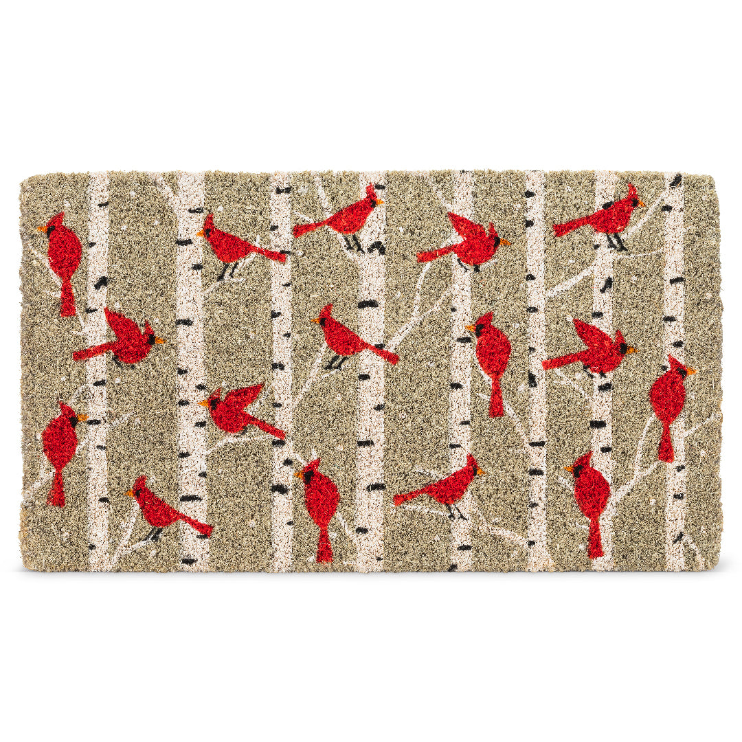 Premium outdoor doormat, hand made from Coconut Husk Fiber and rubber on the back. Grey mat with multiple red cardinal birds perched on white birch trees. Doormat has course texture.