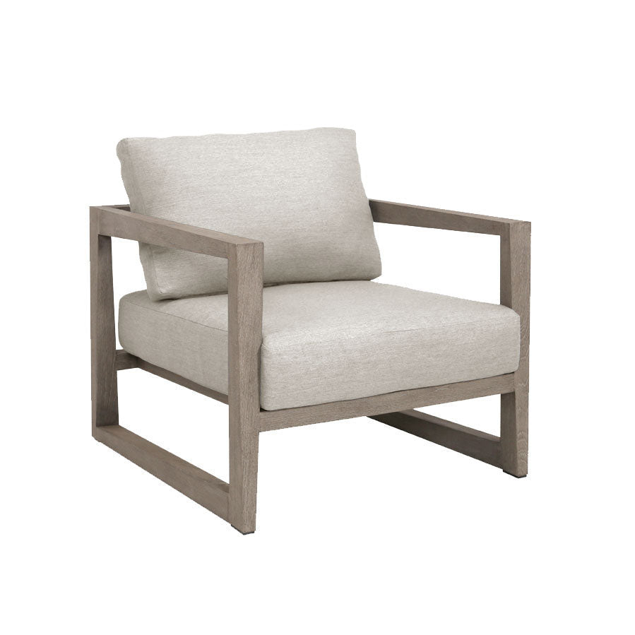 contemporary outdoor square teak chair, weathered look, crate style frame, deep seat and back cushion in Cast Silver Sunbrella fabric, open sides