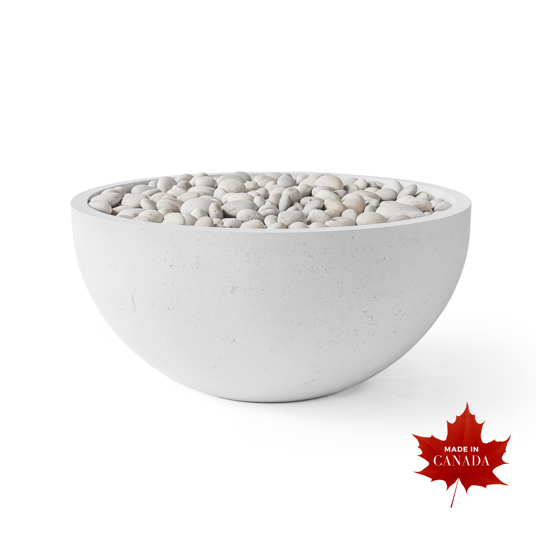 Premium contemporary outdoor Dekko concrete firepit, natural smooth honed Ash finish with raw concrete aesthetic, basin shaped body, decorative smooth natural stones covering top of pit