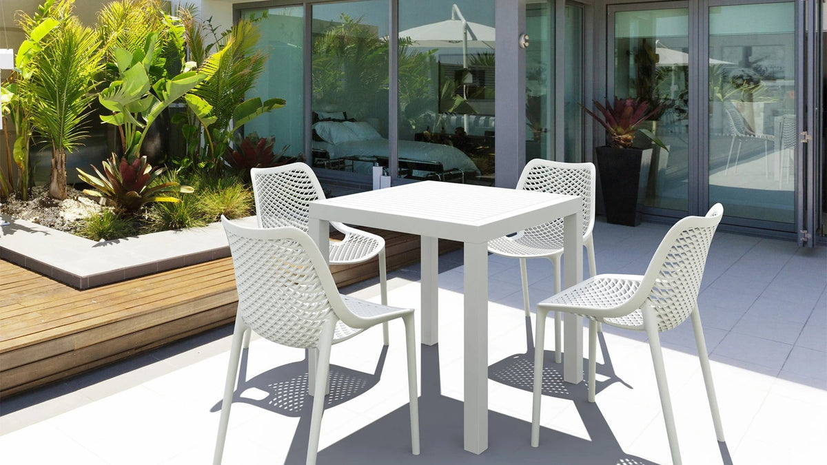 air chairs and table on outdoor patio