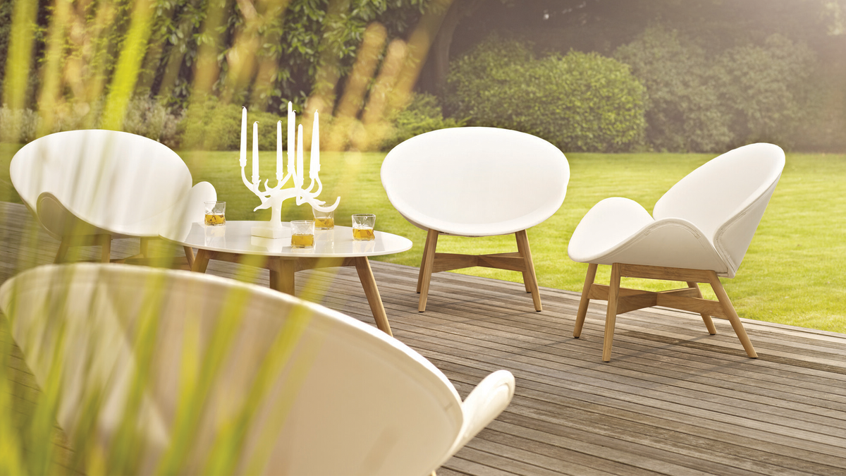 gloster danks outdoor furniture collection on wooden deck