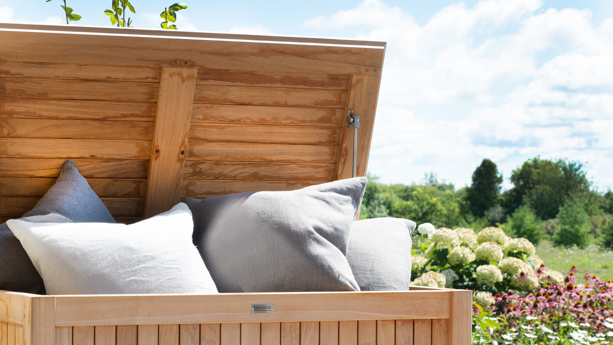 outdoor storage crate filled with pillows