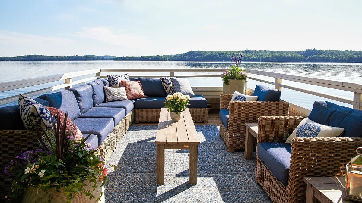 outdoor lounge seating on beautiful waterfront balcony