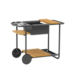 Charcoal grey coloured trolley cart, two wheels on one side, three slatted teak shelves, two removable flexible use compartments, bottle holders  