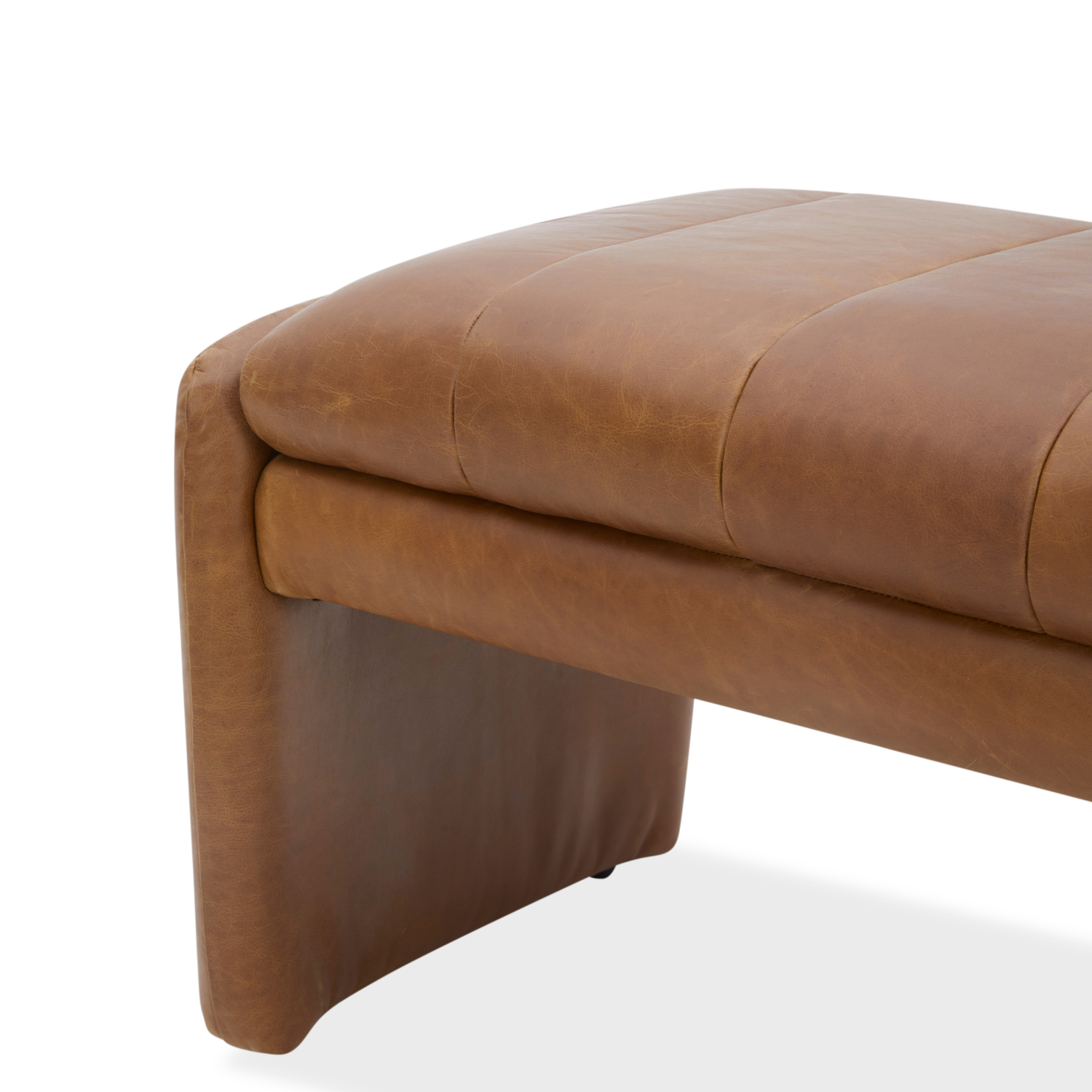 Brown leather ottoman on a white background