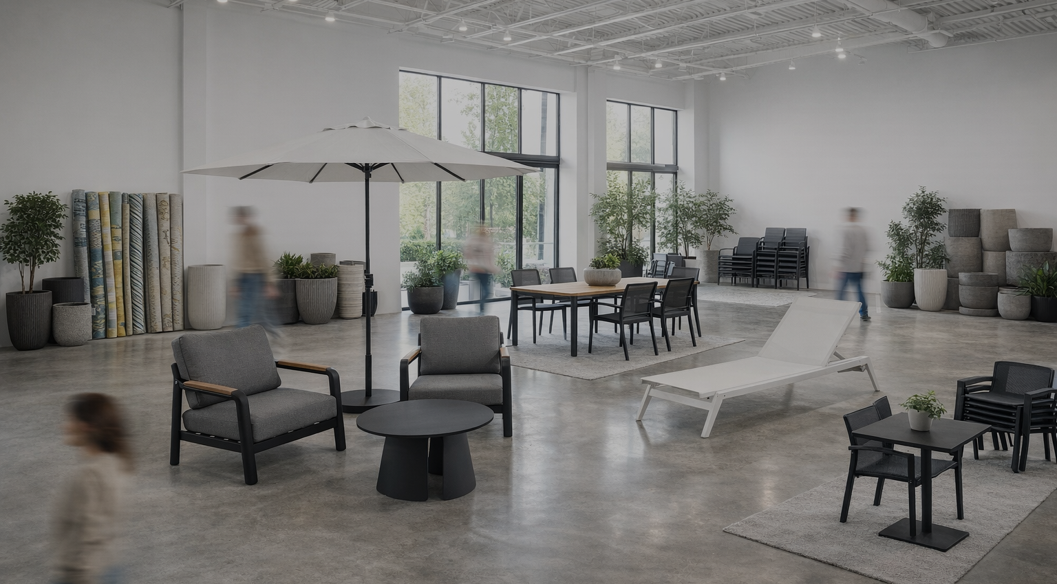 Modern indoor setting with furniture and people walking around