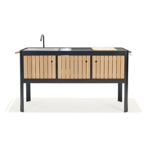 Premium outdoor kitchen, black frame, three teak vertical slatted front doors, curved corners, rectangular sink, contemporary faucet, teak towel holder bar, black bar with hooks at opposite side, loose teak cutting board/sink cover, two built-in removable condiment cubbies