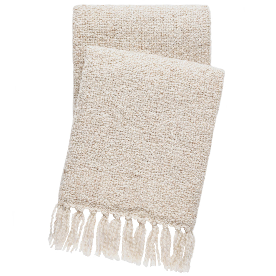 Natural light beige coloured indoor/outdoor throw in a rich polyester boucle fabric with fringe.