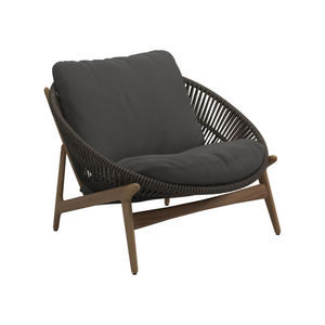 Gloster Bora Lounge Chair in Umber weave with Blen Coal Sunbrella seat cushion and modern teak frame.