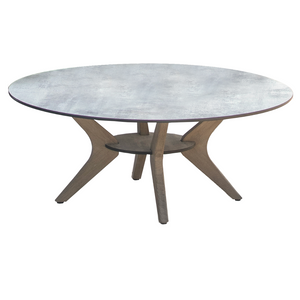 Contemporary outdoor coffee table, natural teak boomerang shaped legs, weathered look, round faux concrete finish laminate table top 