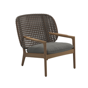Premium contemporary outdoor low back teak chair, brindle weave curved back, deep soft grey seat cushion in Sunbrella fabric