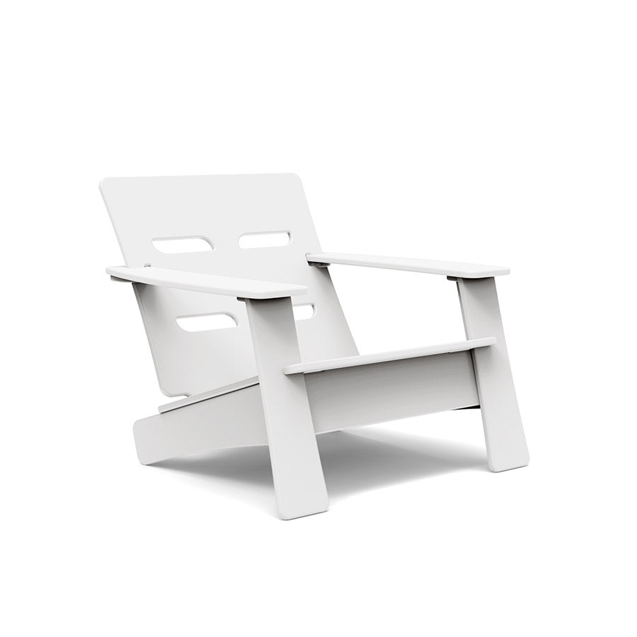 Outdoor, white contemporary Adirondack style polymer lounge chair, 4 oval openings on back, angular arms, legs and seat