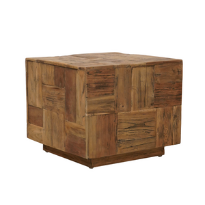 Premium indoor stool crafted in teak. Patched with multiple brown wood squares with dark striations.  Shaped like cube sitting on a smaller cube platform.